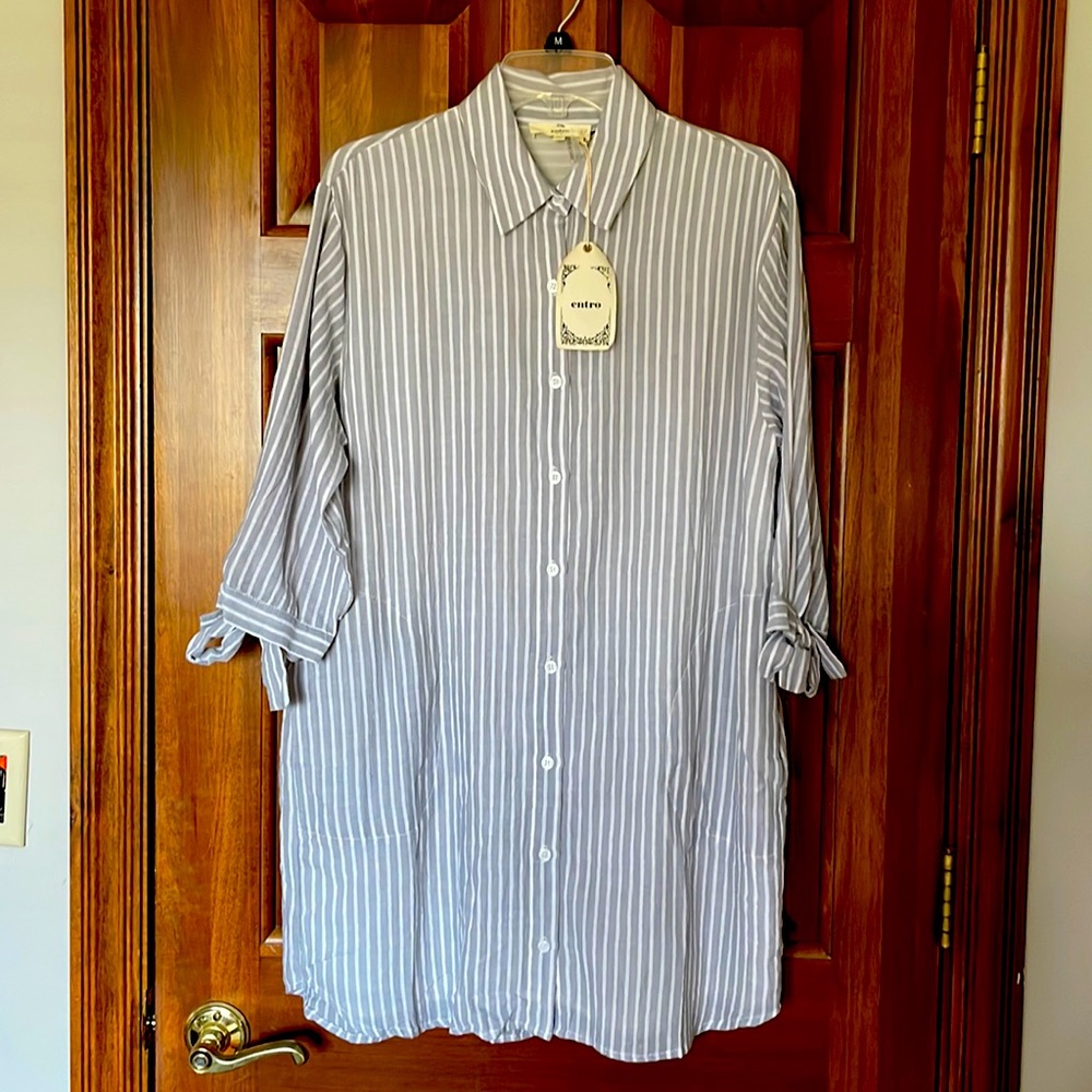 100% cotton top with pockets. Bodice is lined nwt!